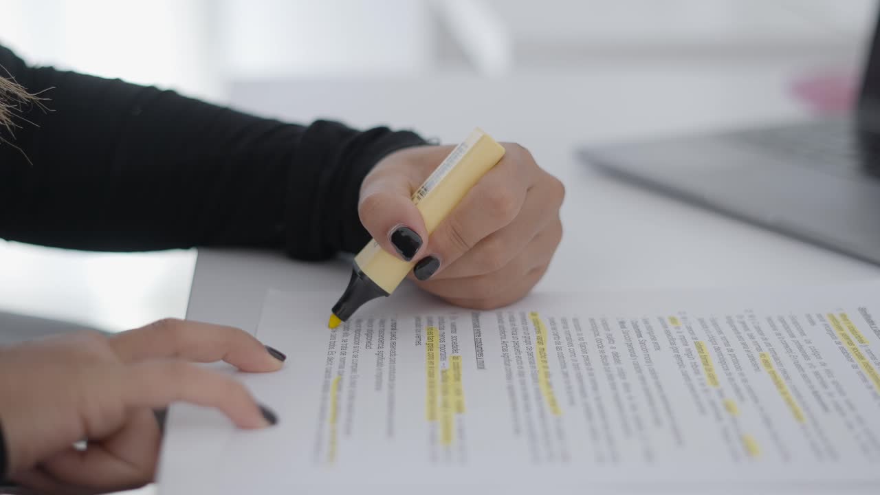 Woman Highlighting Document