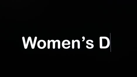 text written on black screen with the word women's day in white