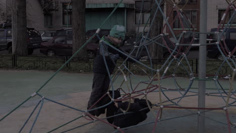 children activity with rope web climber