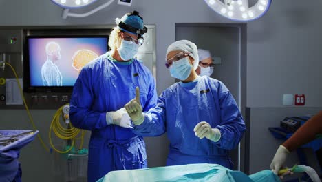 surgeons performing operation 4k