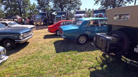 vintage cars displayed at an outdoor event