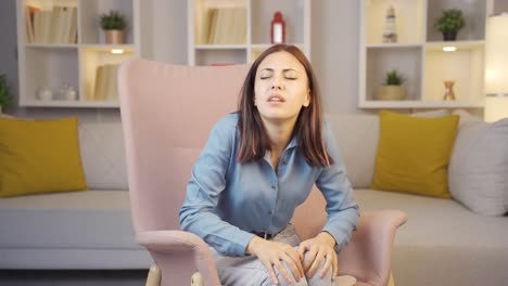 Young-woman-experiencing-pain-in-bones.