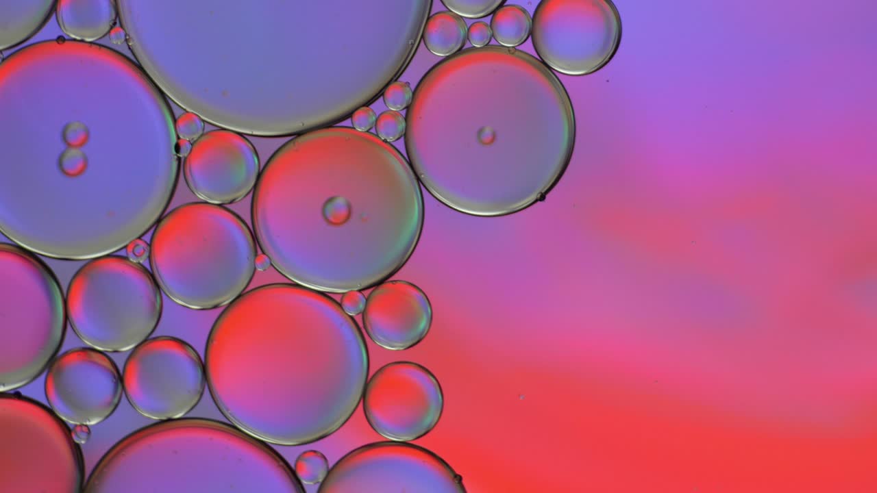 Colorful artistic of oil drop floating on the water.