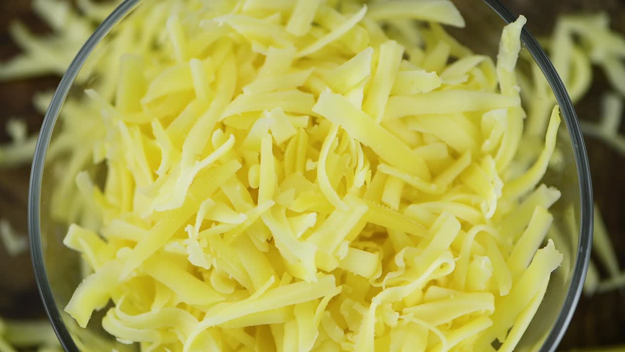 Porzione di formaggio grattugiato (loop continuo; 4K)