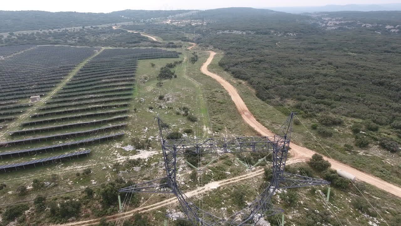 High voltage power line and solar park by drone. France
