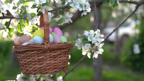 close up of colorful easter eggs in a basket