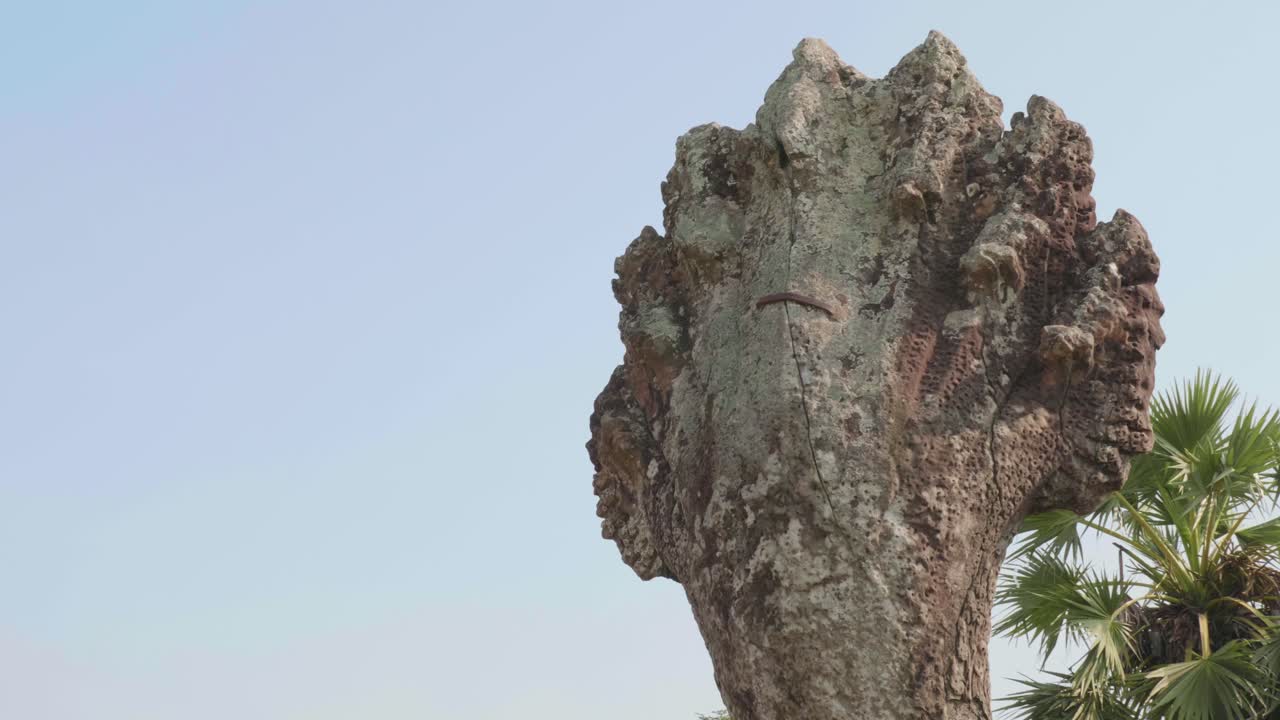 Rotating Around A Sculpture At The Temple Angkor Wat. 4K.