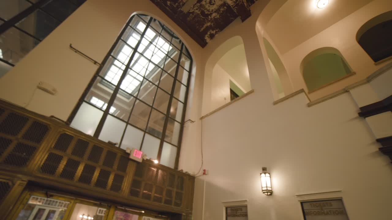 Grand Building Interior with Staircase and Classical Architecture