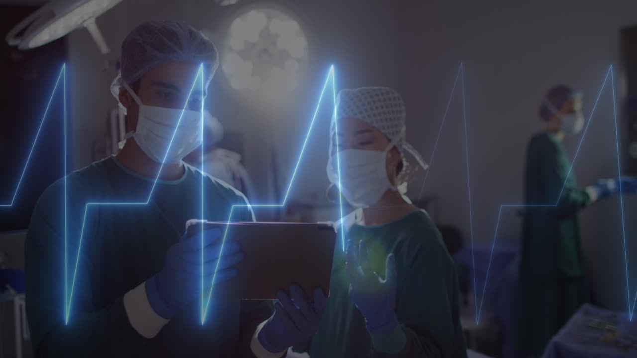 병원에서 태블릿을 사용하는 다양한 외과 의사에 대한 심장 사진의 애니메이션