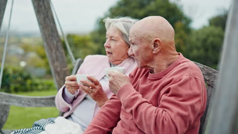 love, coffee and old couple on bench in garden