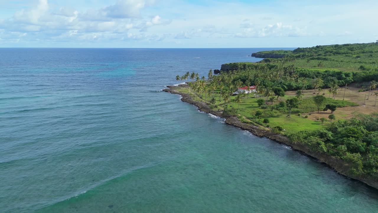 Las Galeras, rocky coast and cliffs, Samana in Dominican Republic. Aerial forward