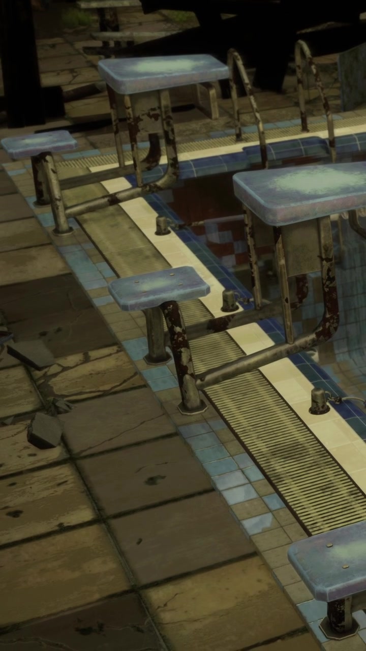 Daylight reveals broken tiles and rusted fixtures in the empty pool