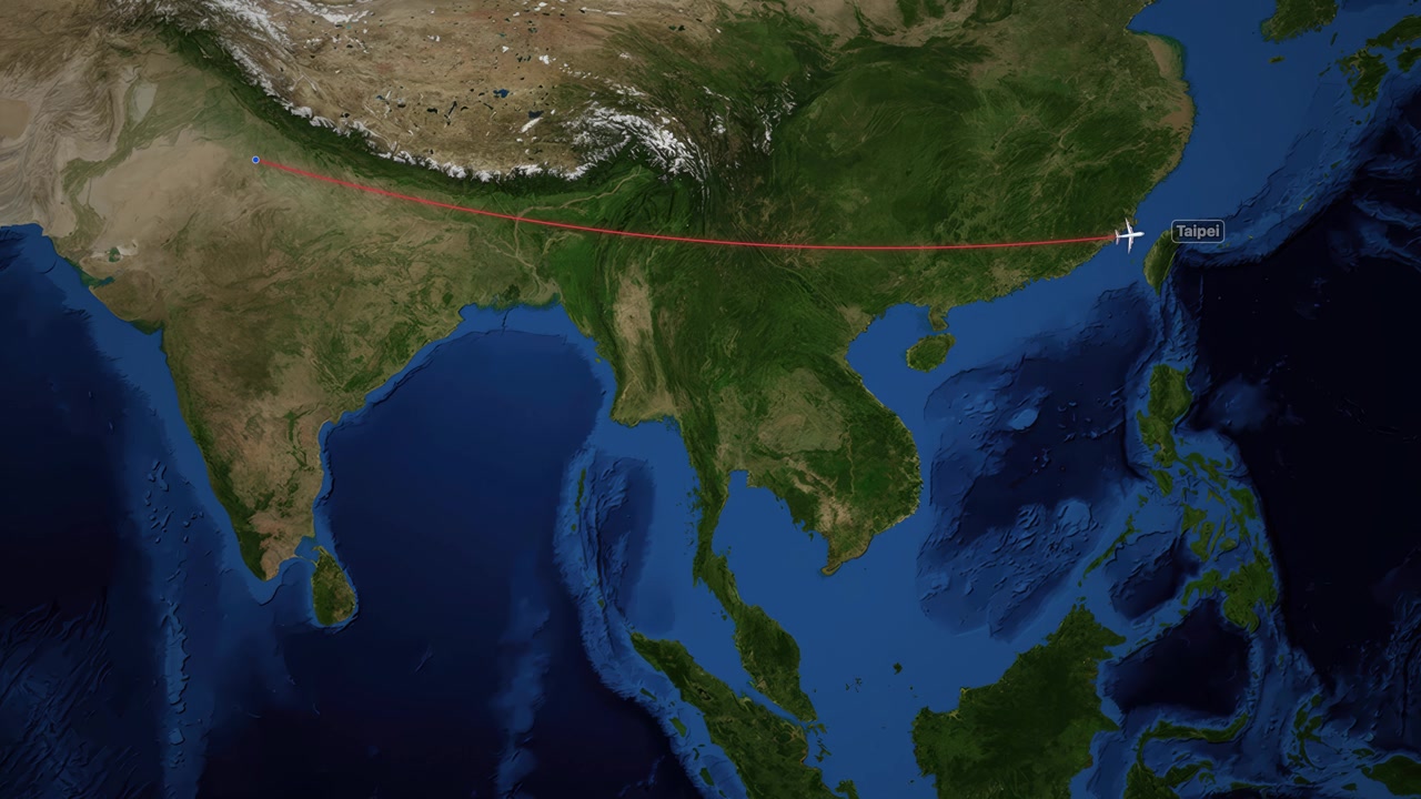 Airplane icon follows red path from Delhi to Taipei across a detailed satellite map view