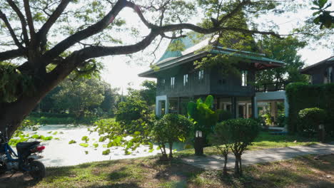 tranquil asian house by a pond
