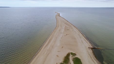 revealing aerial shot of headland in rewa, poland