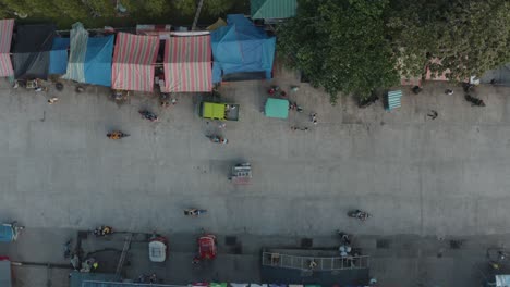 typical daytime scene in a village with small street market in the philippines