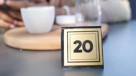 table number 20 at a cafe