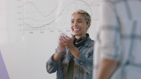 close-up-young-multi-ethnic-business-people-celebrating-successful-project-in-modern-startup-office-happy-diverse-students-enjoying-victory-celebration-clapping-arms-raised