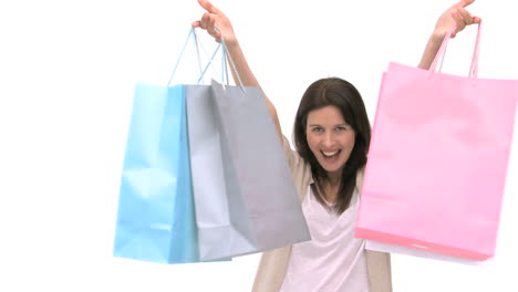 mujer feliz con bolsas de compras