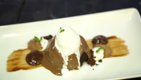 ice cream on top off over gourmet chocolate pudding dessert