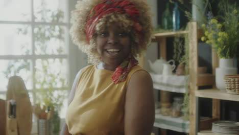 african american food blogger telling recipe on camera