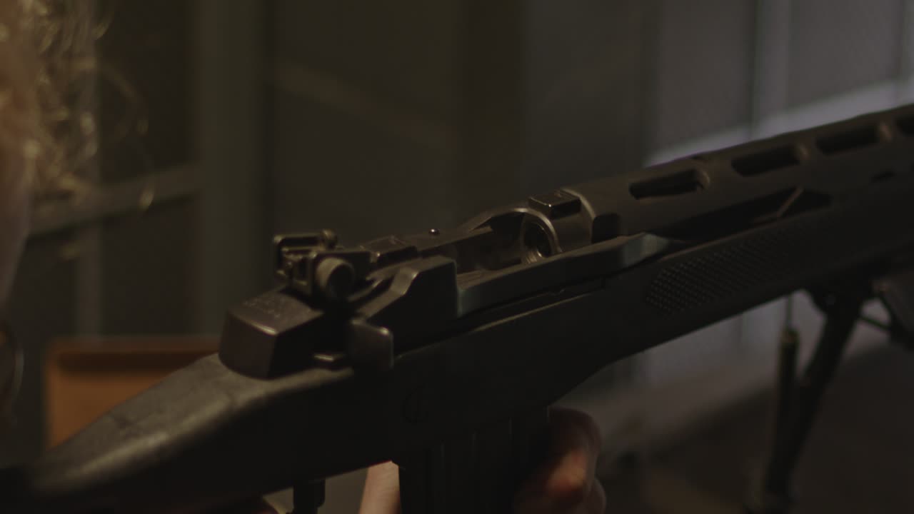 Close up of Ruger Mini-14 firing it's last round and the bolt stays open