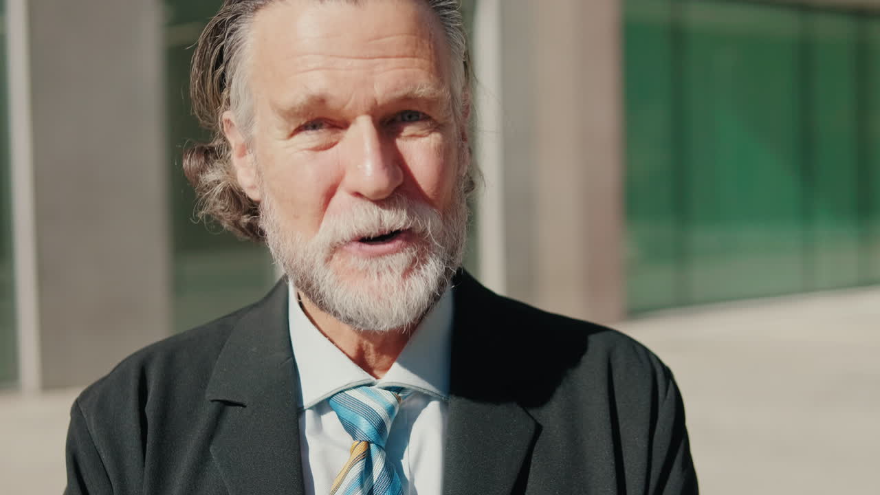 Happy Businessman Smiling Outside Office Building