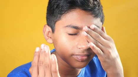 Upset-boy-suffering-from-strong-eye-pain