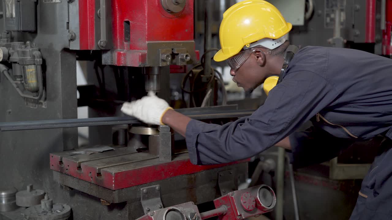 Engineers and skilled technicians are maintaining machinery. Engineers are working and repairing machines in industrial. Technician holding Measuring pliers. Scale Metal Vernier caliper measuring.