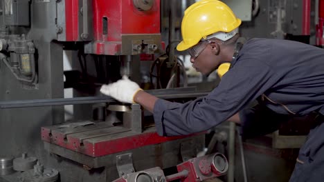 engineers and skilled technicians are maintaining machinery. engineers are working and repairing machines in industrial. technician holding measuring pliers. scale metal vernier caliper measuring.