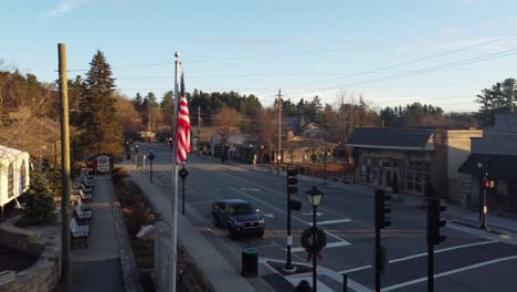 blowing-rock-nc-reverse-aerial-with-American-flag-in-shot