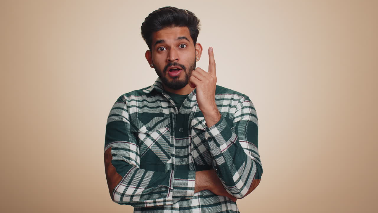Inspired indian man having good idea plan startup showing inspiration motivation eureka gesture