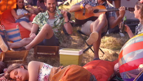 in high quality format pretty hipster relaxing on campsite