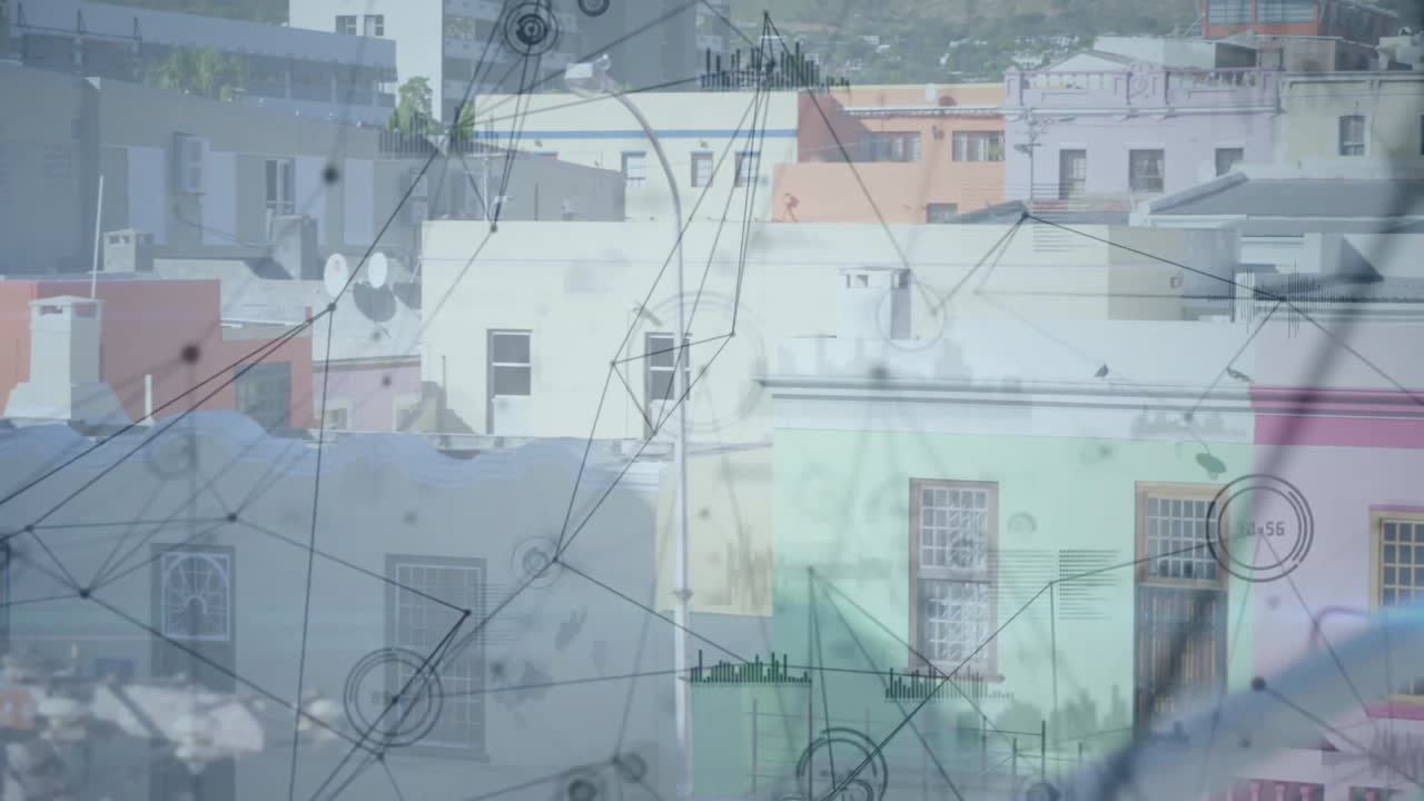 Network of connections and data processing animation over colorful urban buildings