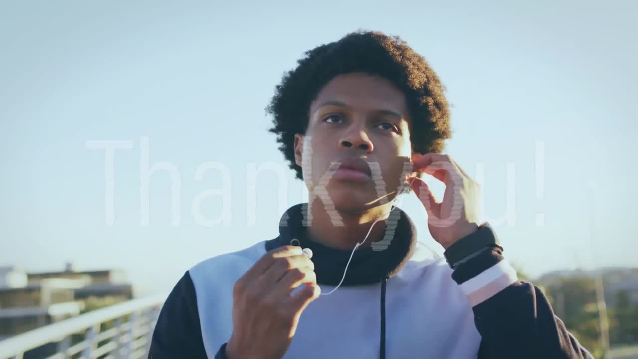 Animation of thank you text over biracial runner wearing earphones