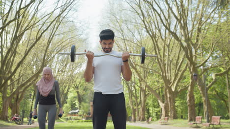 couple working out in a park