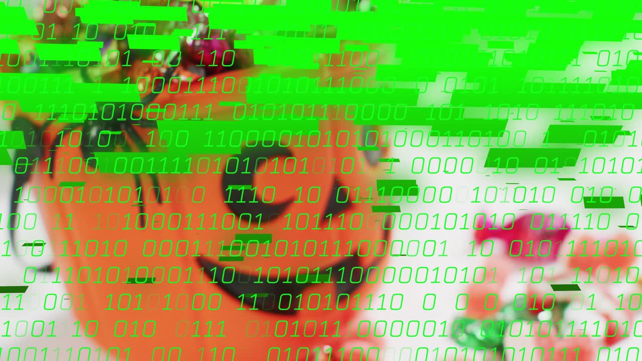 Binary glitch effect starting, flooding jack-o'-lantern bucket and candies to show digital takeover
