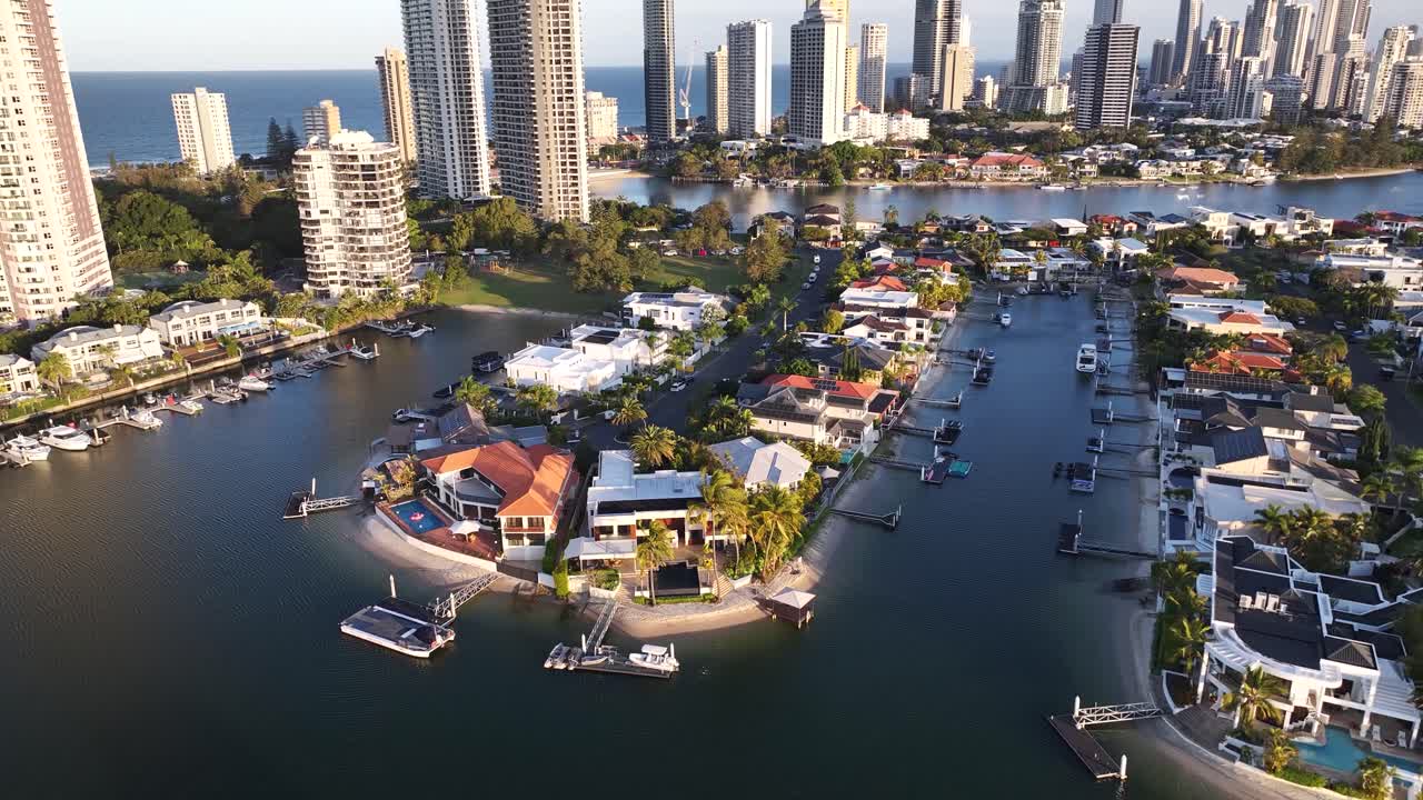 Beautiful aerial cityscape of Gold Coast city with landmarks , sunset warm light, skyline.