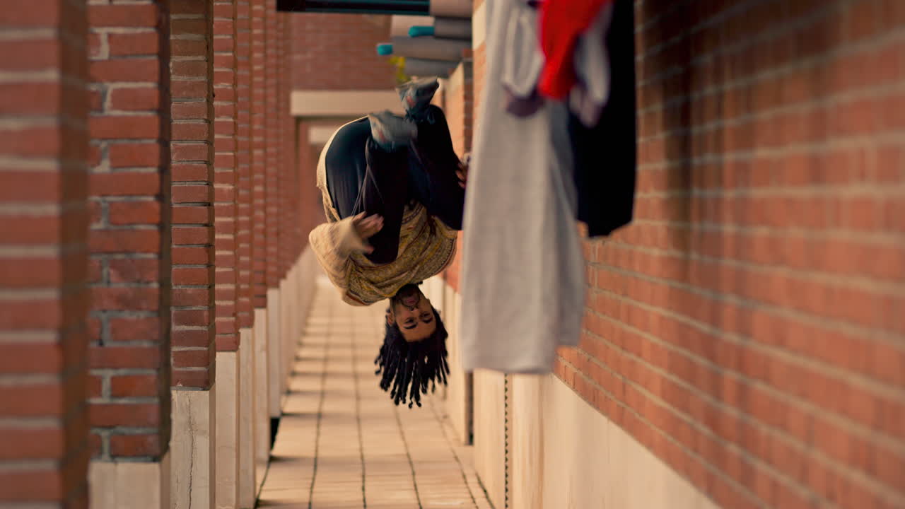 Man running in urban alleyway