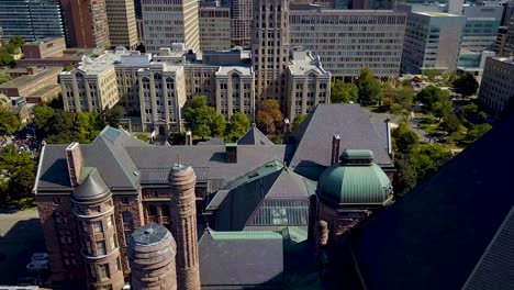 view of ontario legislature and downtown toronto buildings, aerial drone slide