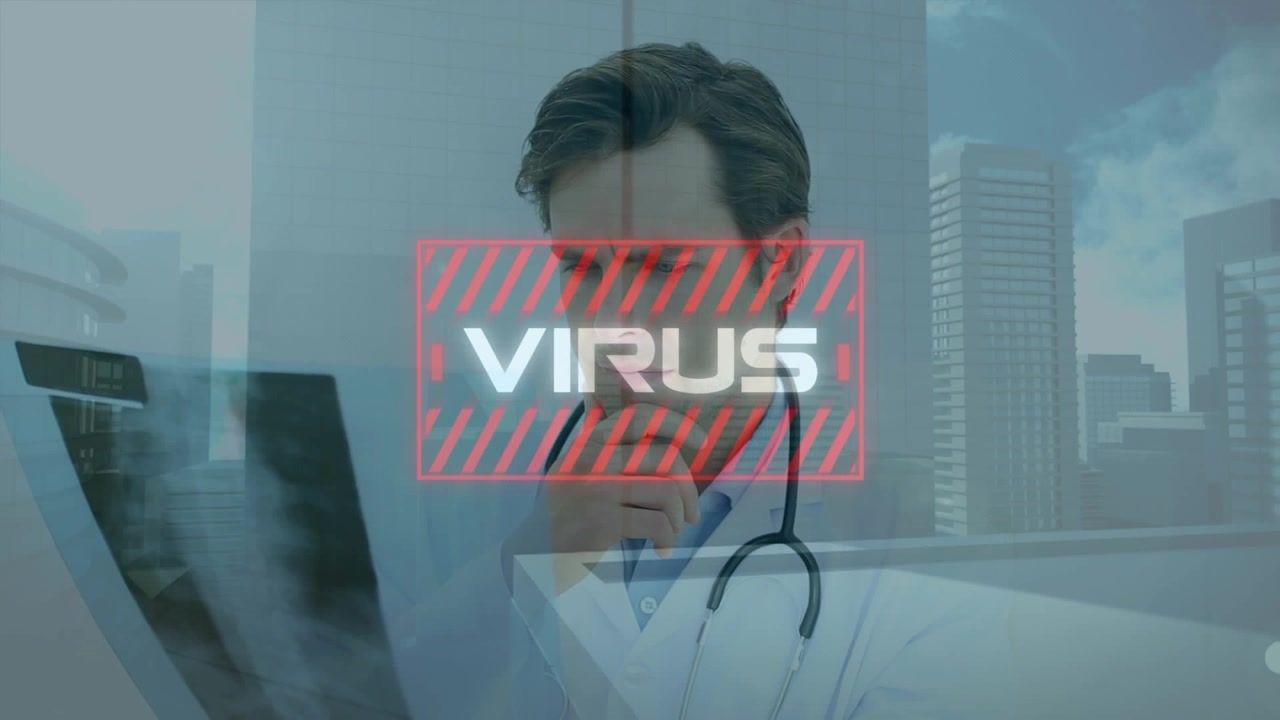 Animation of virus text over caucasian male doctor with xray