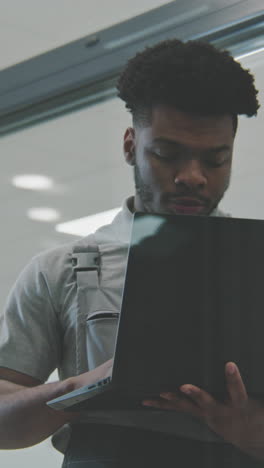 man working on laptop