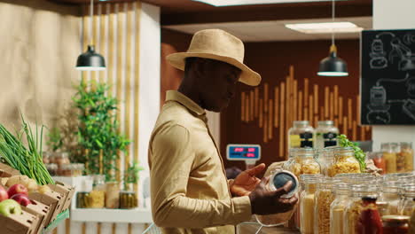 african american buyer visiting local farmers market to shop