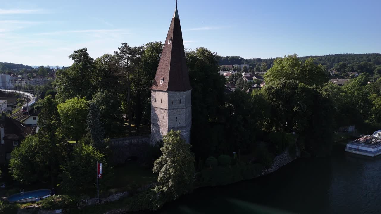Krummturm Crooked Tower in Solothurn, Switzerland Aare river shore, aerial drone