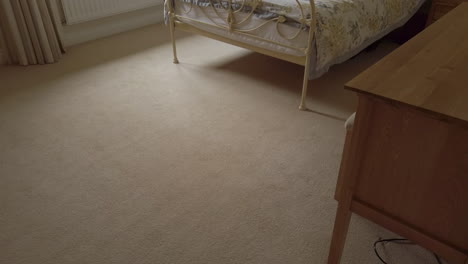 upward tilt shot of a modern looking bedroom in a rural home in slow motion