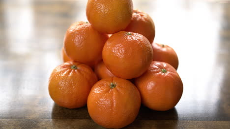 close up of a pile of mandarin oranges