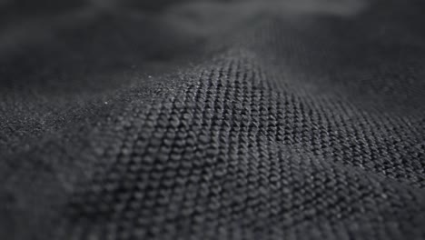 close-up view of dark fabric texture