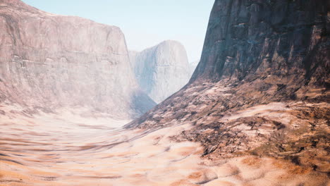 a vast desert canyon with towering cliffs