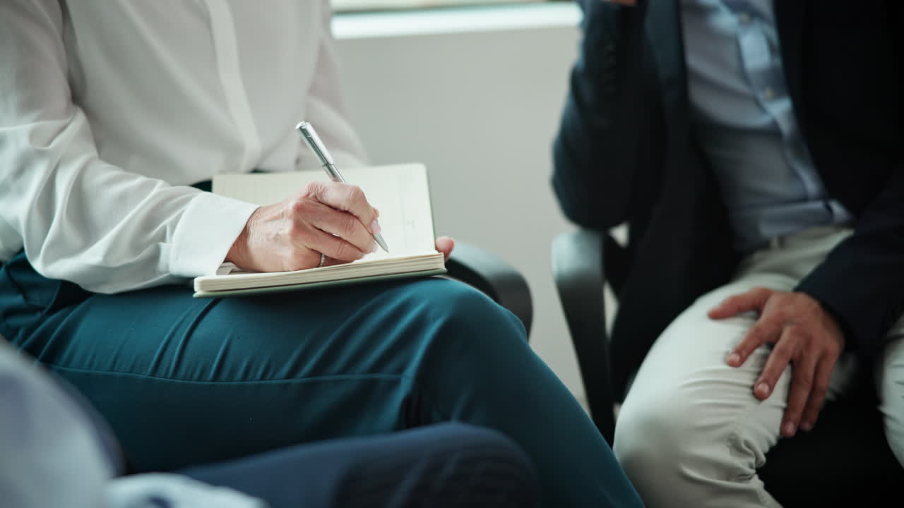 Forretningsmøde med notetagning