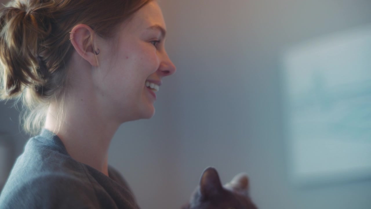 A woman and her cat at the vet clinic